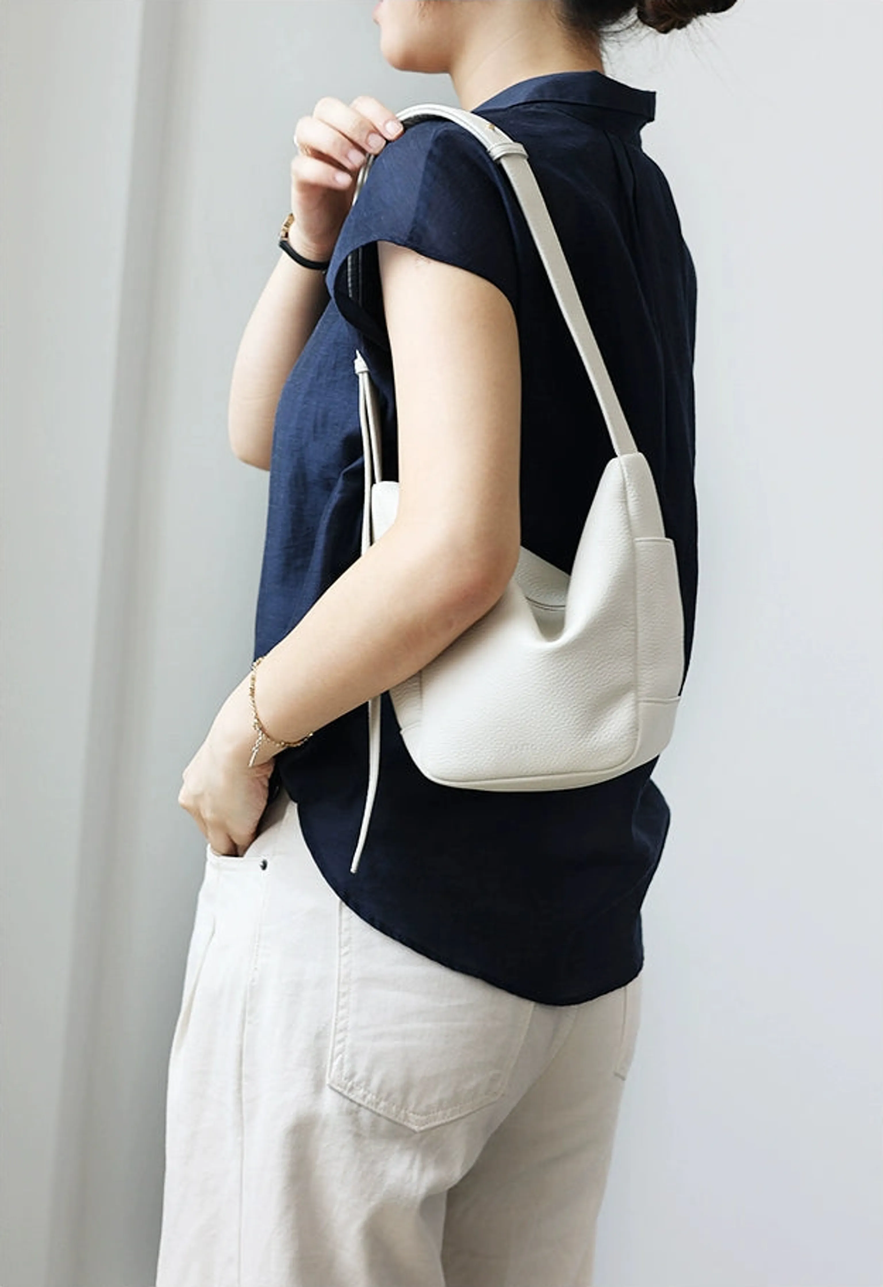 Minimalist Pebbled Leather Bucket Bag - Image 9