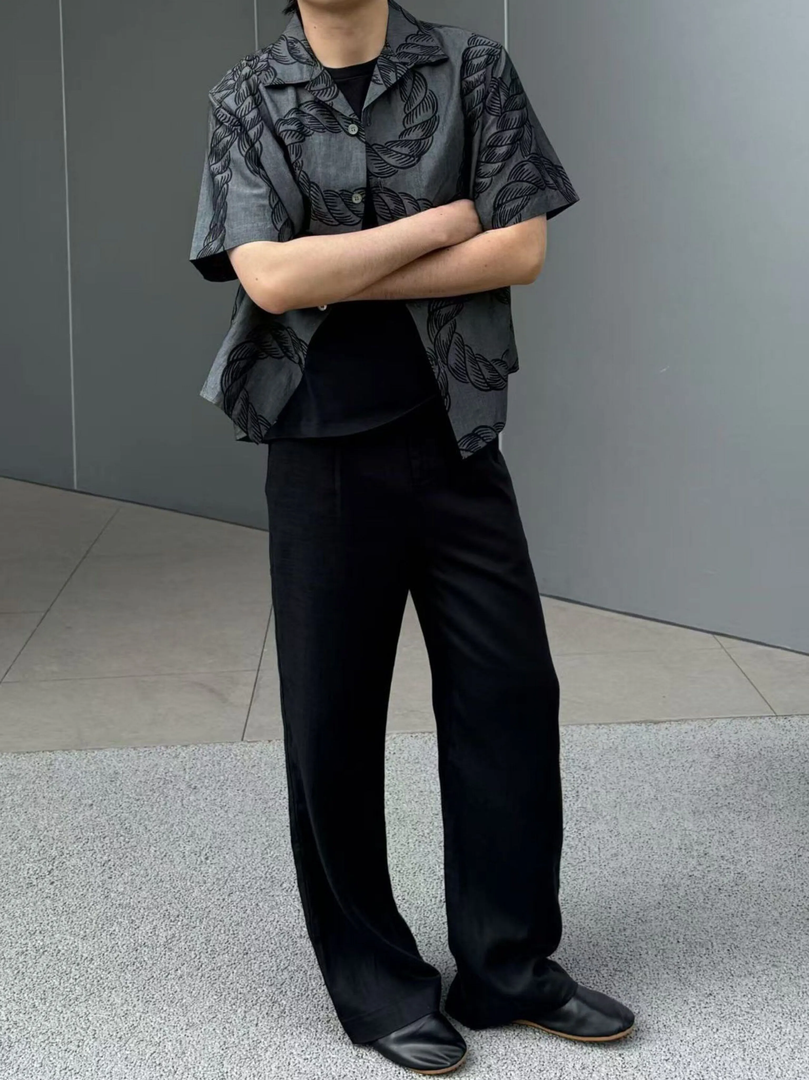 Wide-Leg Pleated Trousers